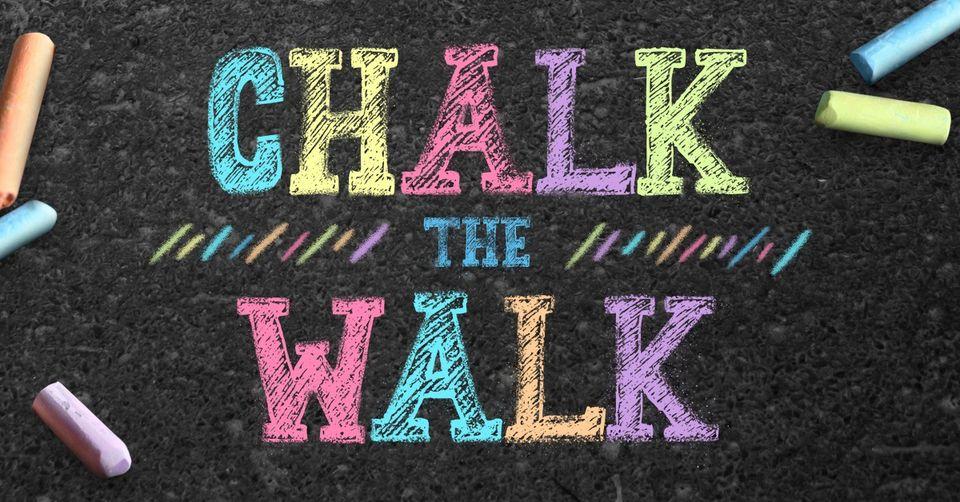 Text: Chalk the Walk, with colorful sticks of chalk laying around the text