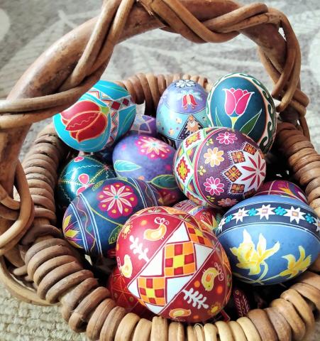 decorated eggs in a basket