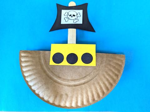 Pirate ship made from a brown paper plate