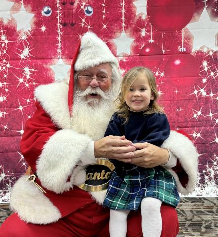 Santa holding child