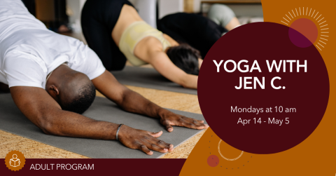 Photo of three people practicing yoga