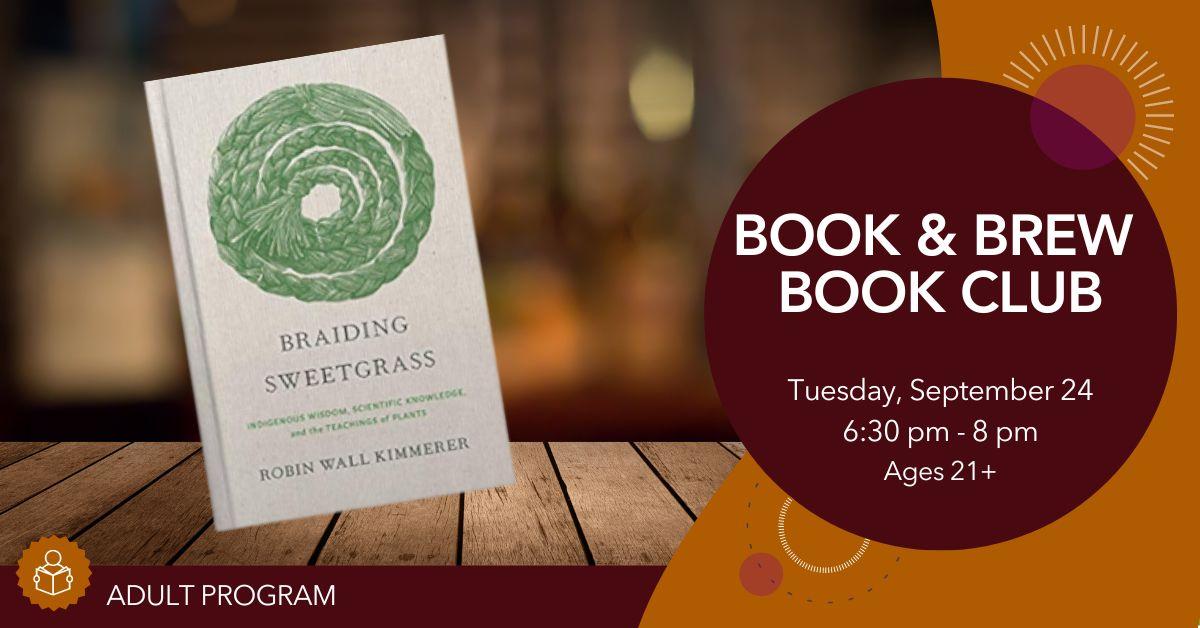 Photo of Braiding Sweetgrass book on top of a wooden table