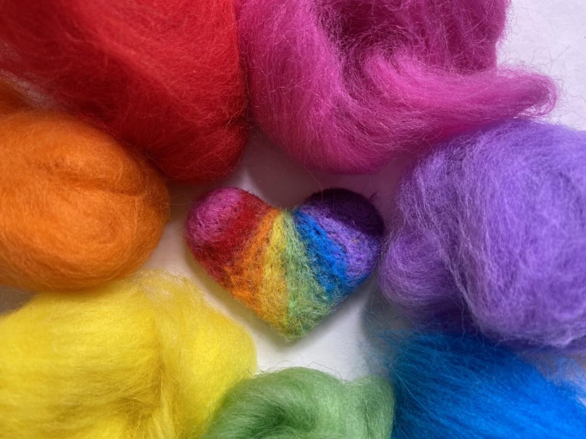 colored roving and a felted heart